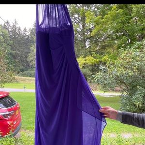 Long purple bridesmaid dress.